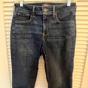 “Lift n Tuck” slimming long denim shorts by NYDJ